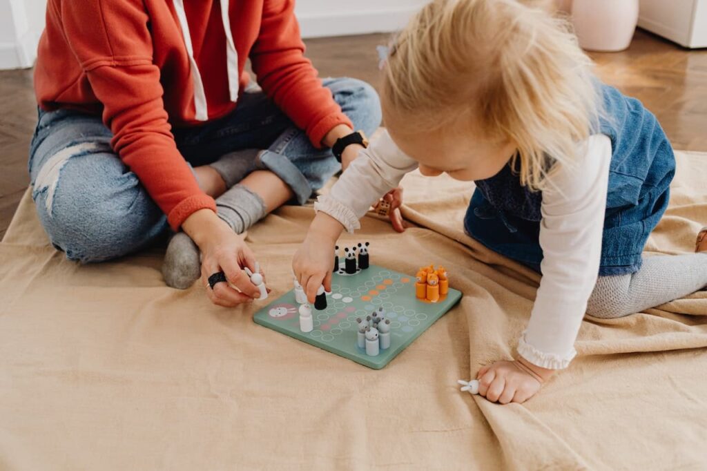 Baby playing ludo