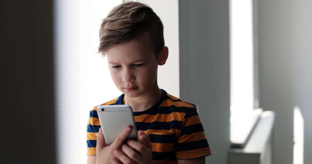 Child Using A Mobile Phone